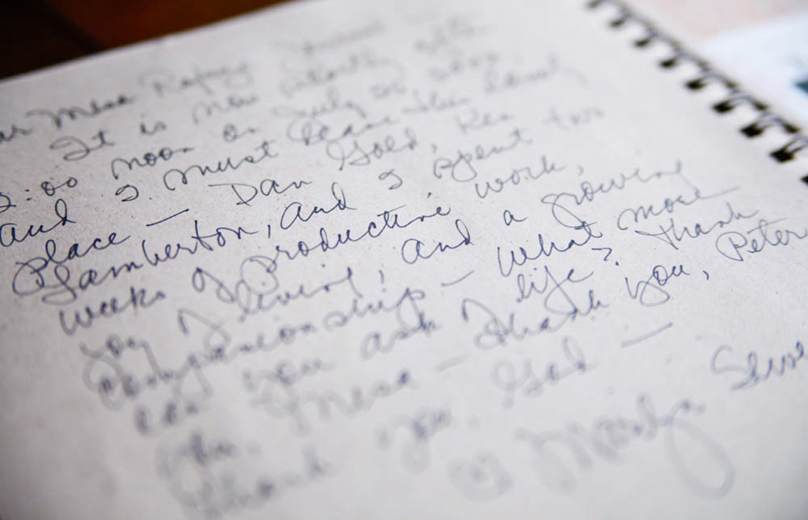 Close-up of handwritten reflections in the Mesa Refuge guest book.